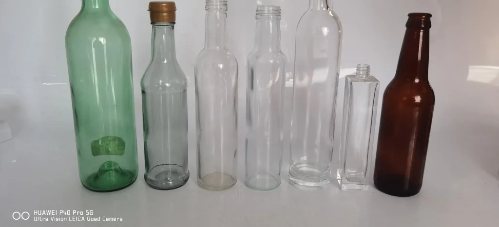 Glass bottles with different material colours